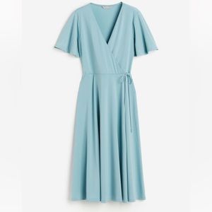 H&M turquoise jersey wrap dress. Like new, only worn twice for weddings.